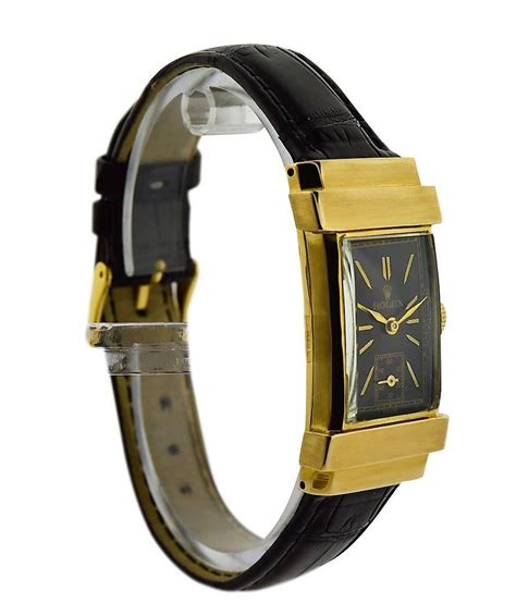 rectangular rolex tank watch.